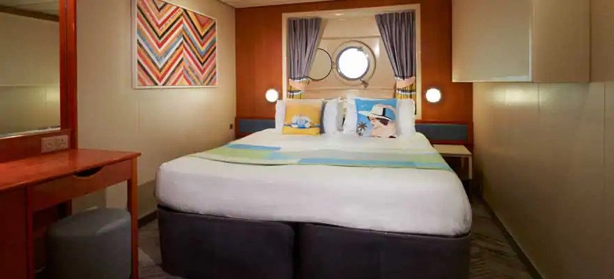 Каюта с окном "Mid-Ship Oceanview Porthole Window Stateroom"