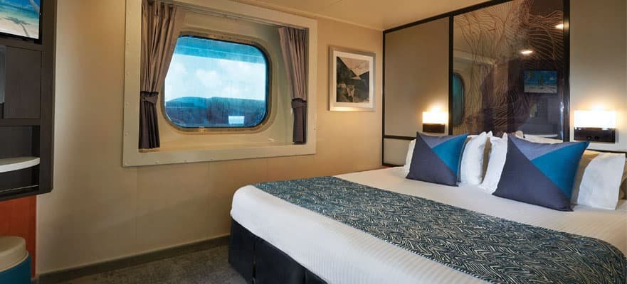 Каюта с окном "Obstructed Oceanview Stateroom"