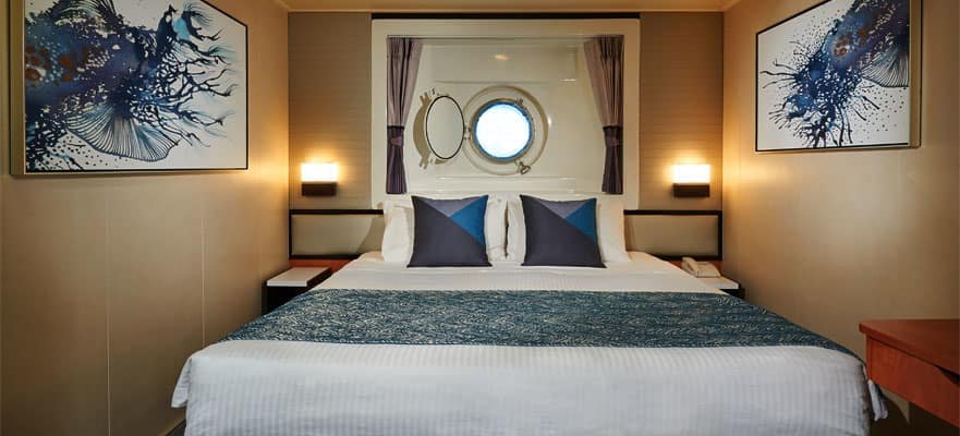 Каюта с окном "Mid-Ship Oceanview Porthole Window Stateroom"